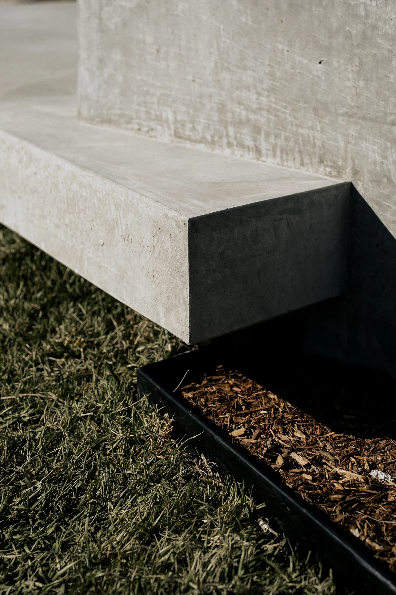 Bespoke vertical concrete form with hand-finished surface