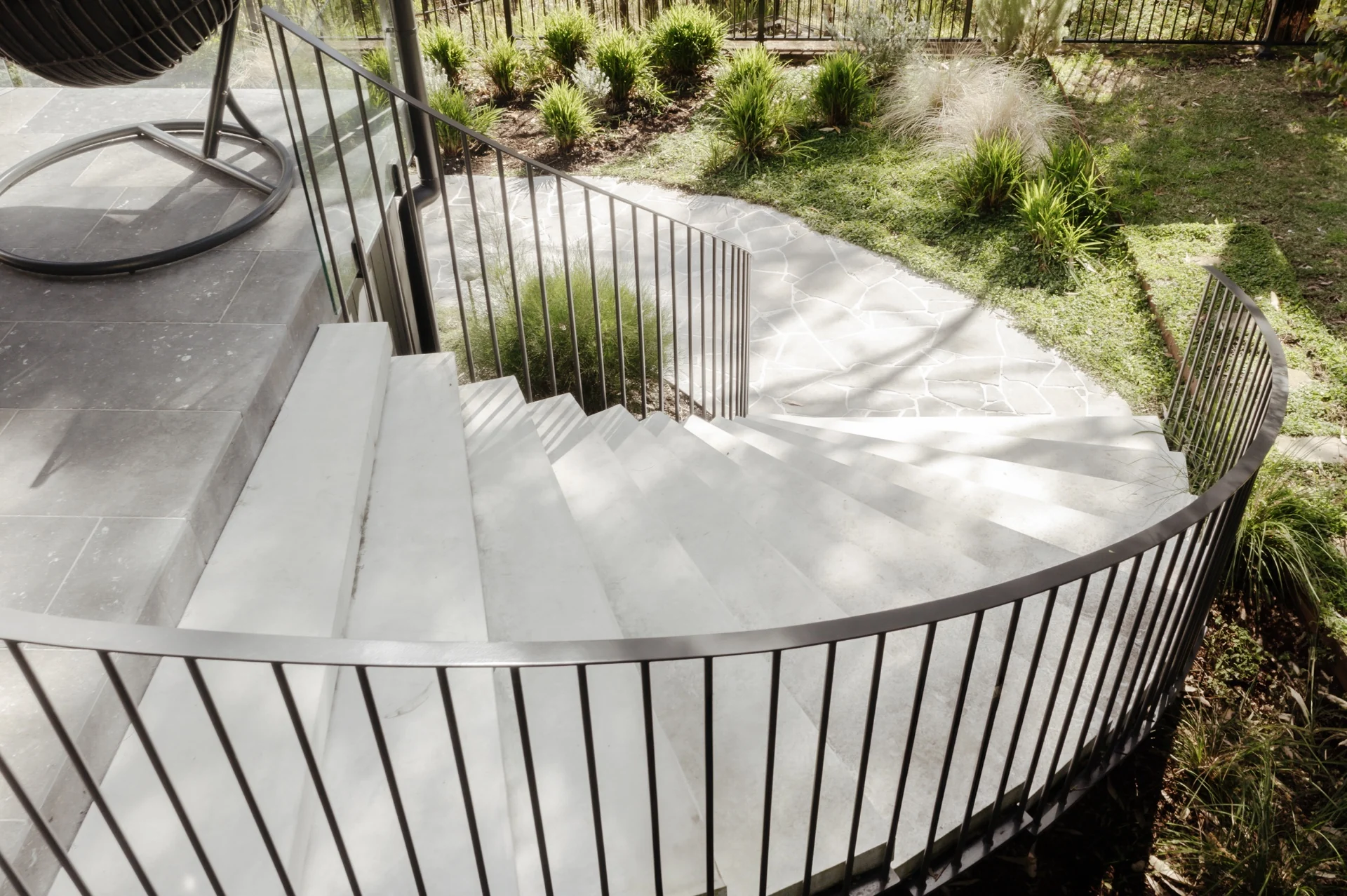 Completed concrete steps linking levels in a landscape